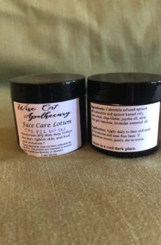 Two jars of handmade herbal face care lotion